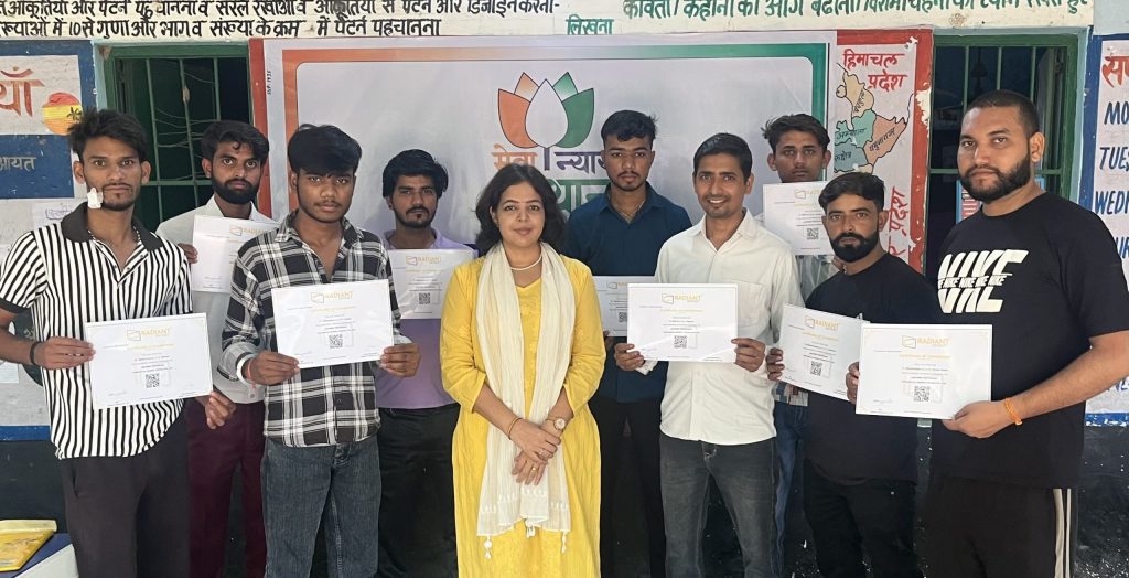 Youth holding certificates after completing a structured salon skill training programme.